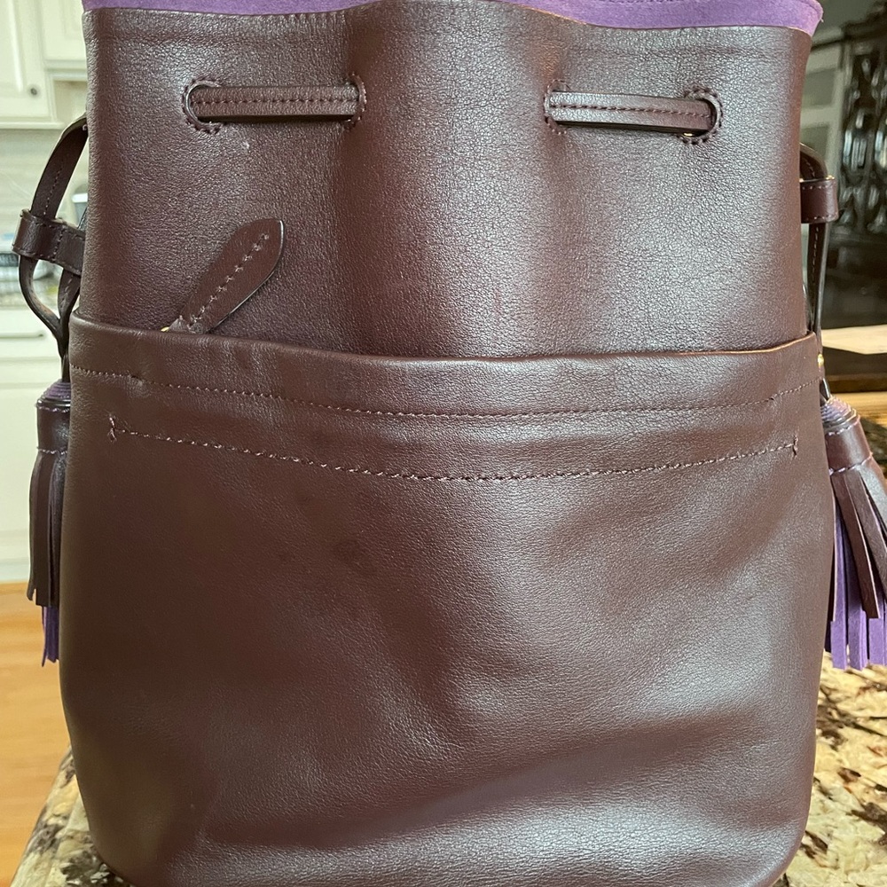 Designer,  Kerry Washington stand up to violence, purple purse.